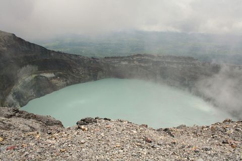 A crater filled with water on a grey day at Rincón de la Vieja
Volcano.