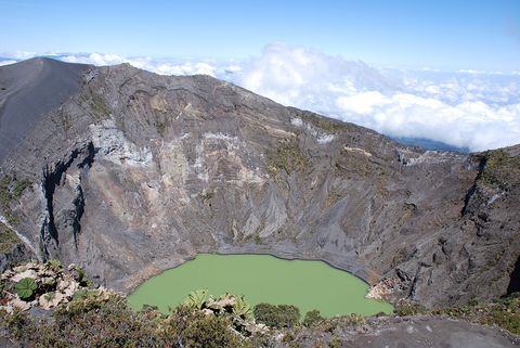 A green water filled crater at Costa Rica’s Irazú Volcano.
